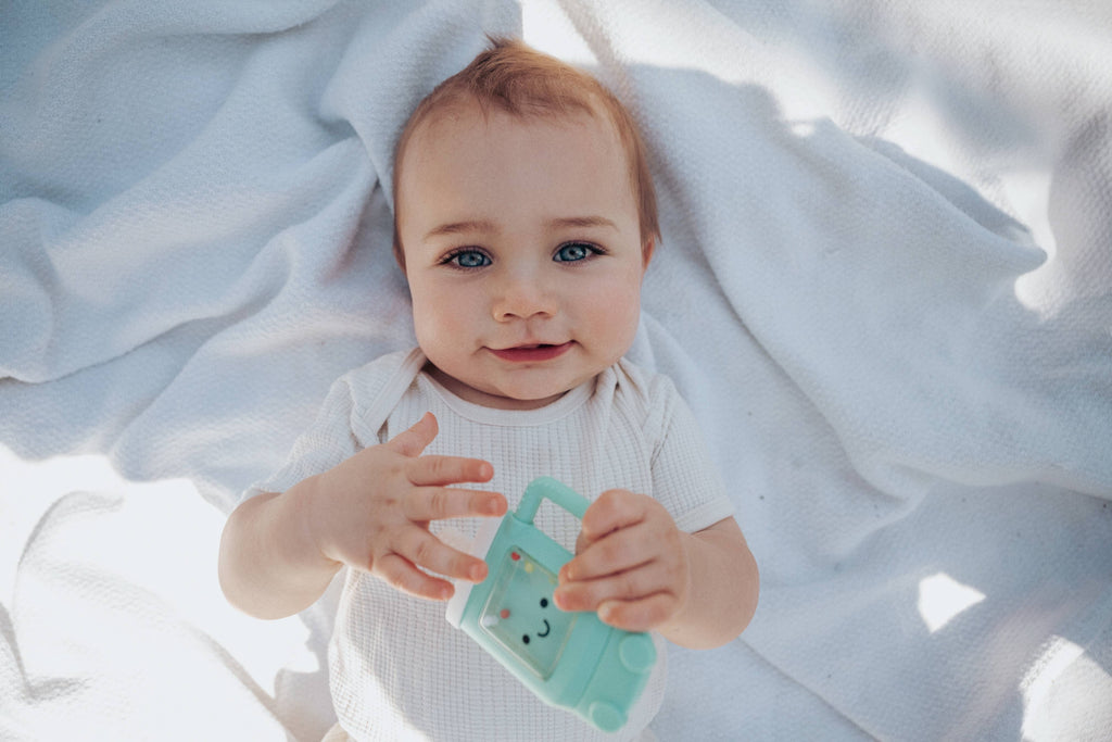 Sweetie Shake Plus™ - Teething + Rattle Toy: Tumbler